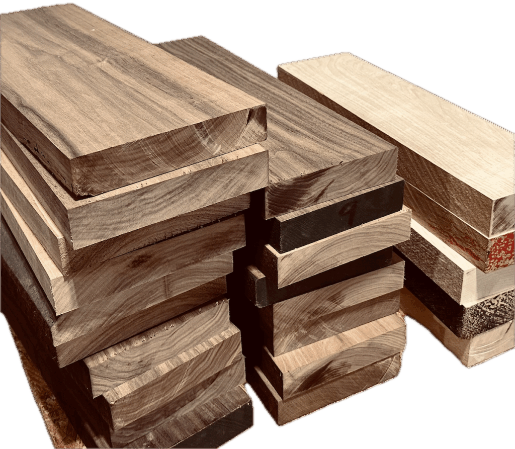 Stacks of walnut and white oak lumber